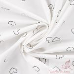 Napfényre színesedő pamut jersey - szívecskék